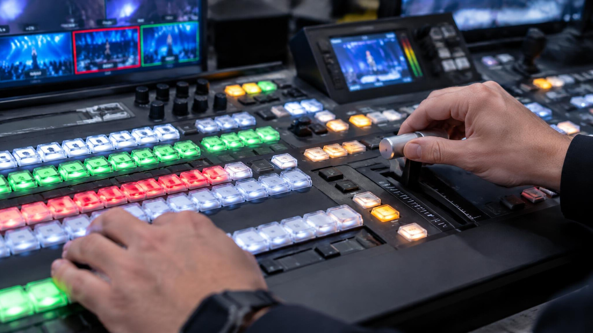 Video switcher console with multiple channel buttons